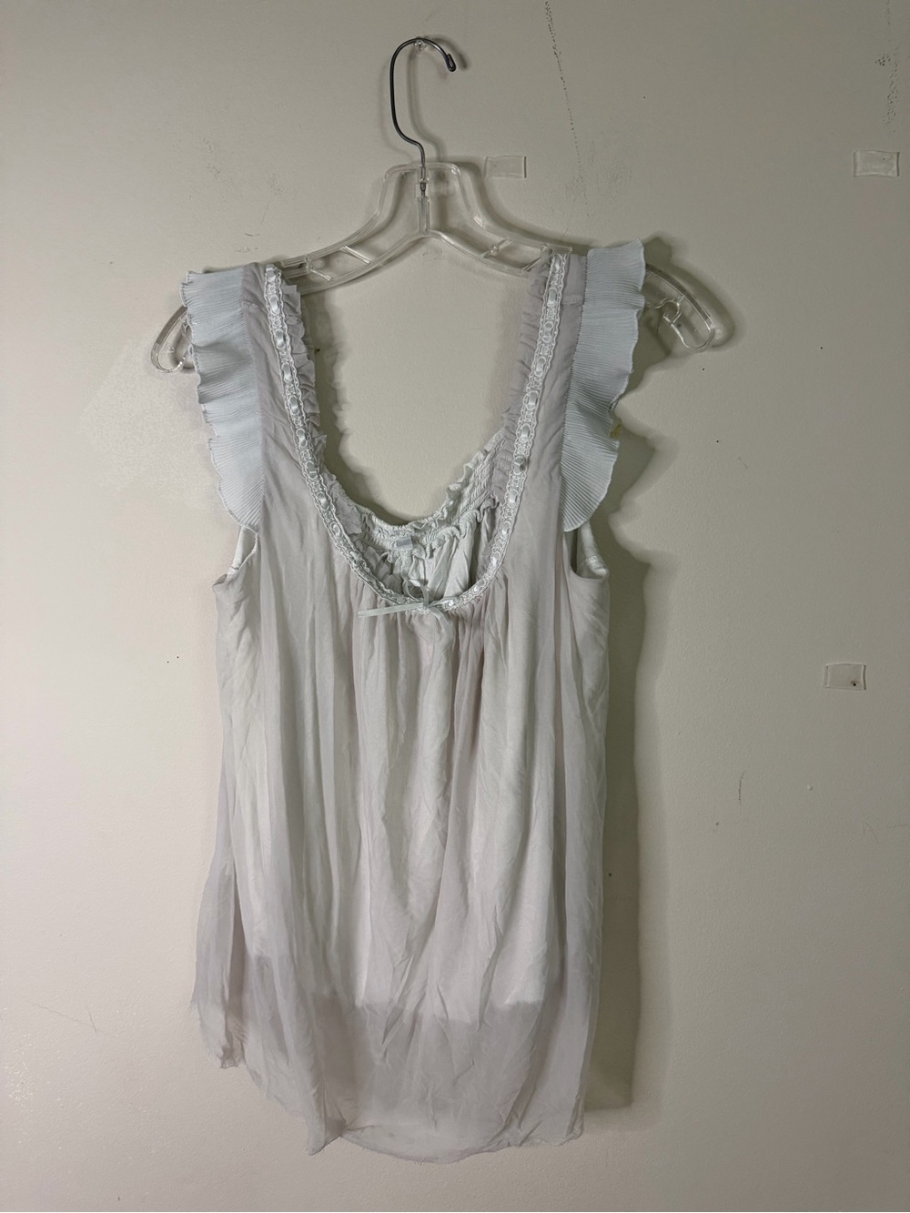 Women’s White Ruffled Sleeveless Peplum Tunic